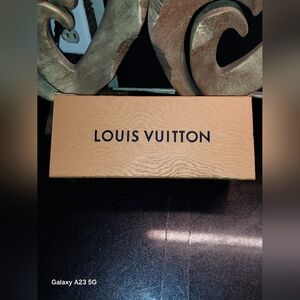 Louis Vuitton storage box w/ book